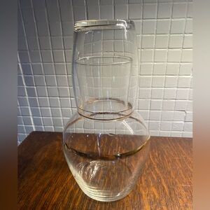 Vintage Libbey glass tumble up carafe and glass set with double gold rim.